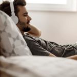 Man relaxing and watching Netflix.