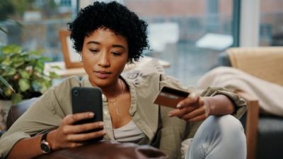 woman paying using paypal