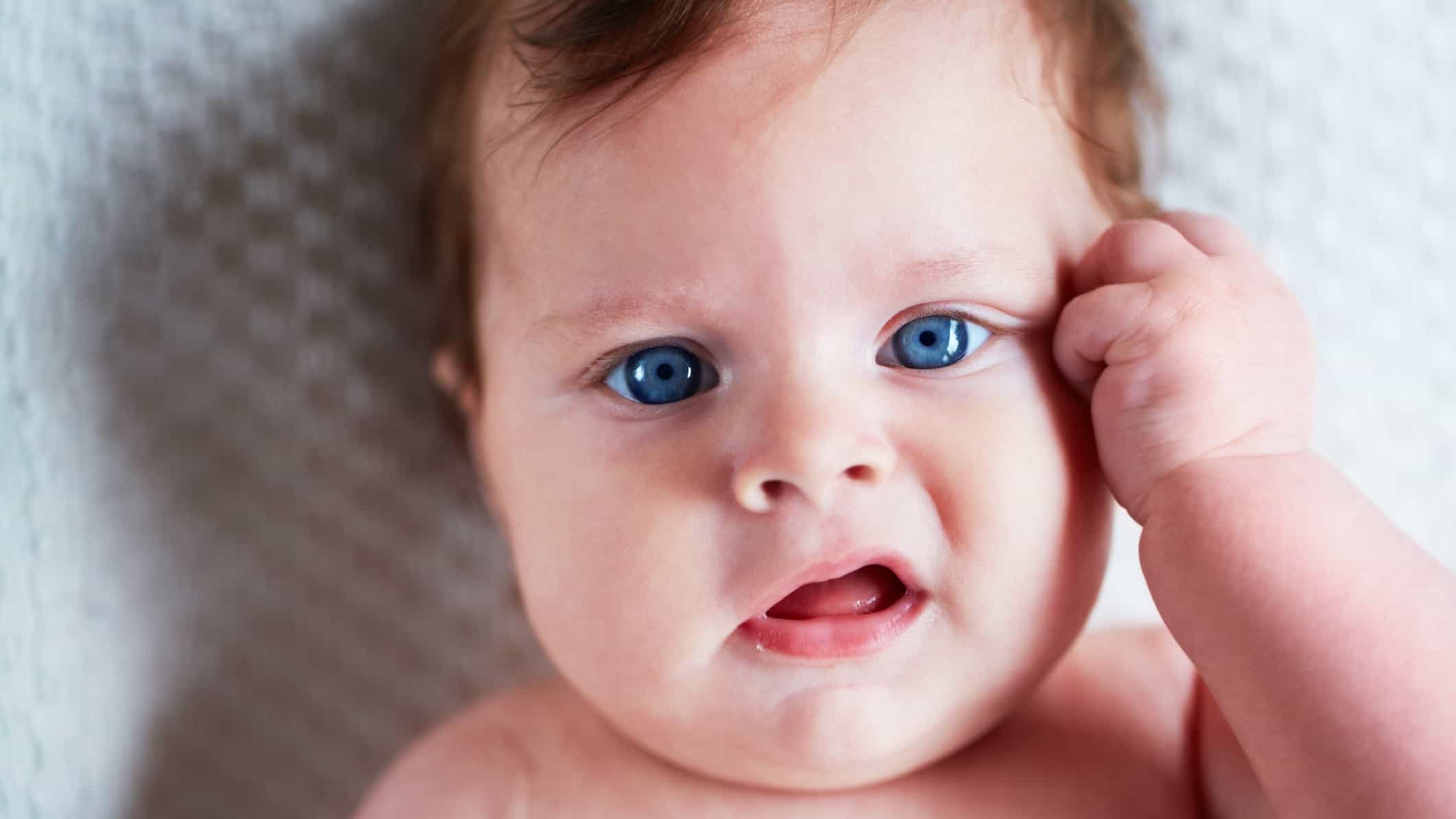Close up of baby looking puzzled