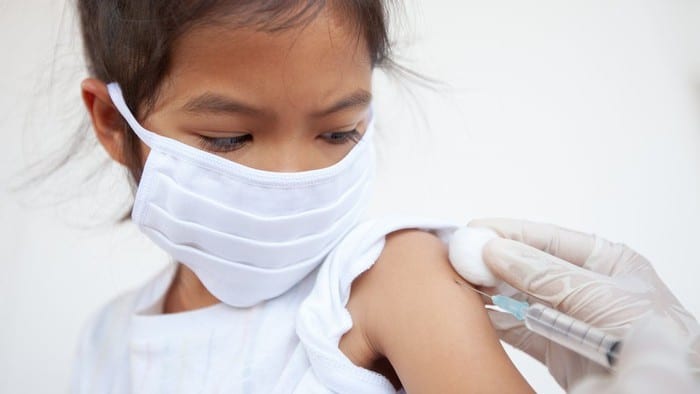 girl receiving pfizer vaccine