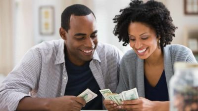 Couple counting out money