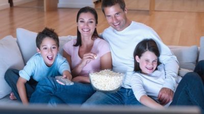 Happy family watching Netflix together.