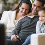 Family enjoying watching Netflix.