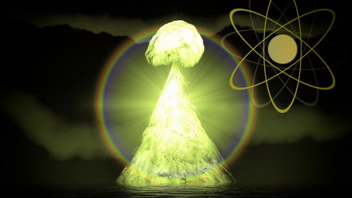 a uranium-fuelled mushroom shaped cloud explosion surrounded by a circle of rainbow light with a symbol of an atom to one side of it.