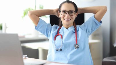 A telehealth doctor at her desk.