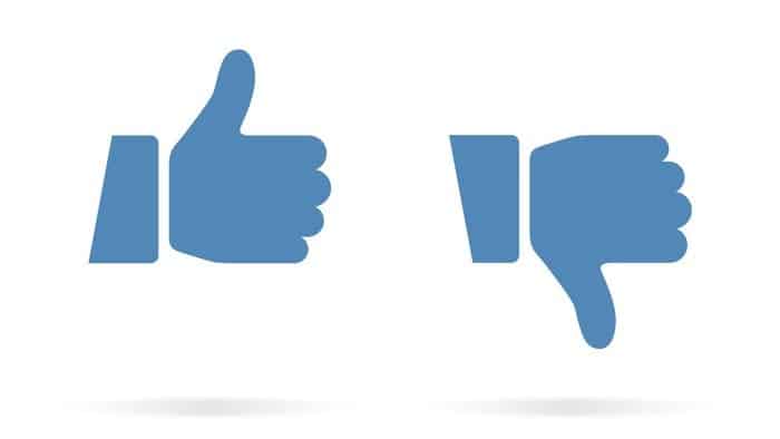 two Facebook "thumbs up" like symbols appear side by side with one pointing downwards in a thumbs down.