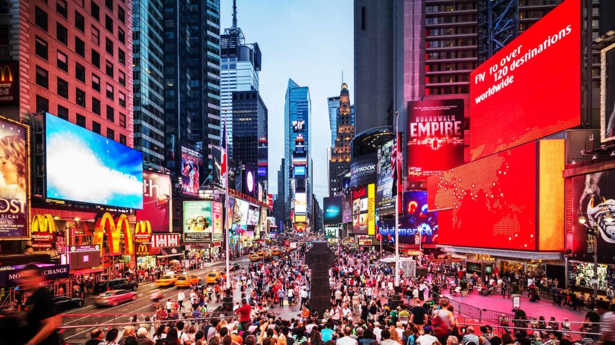 An evening shot of a busy Times Square in New York.