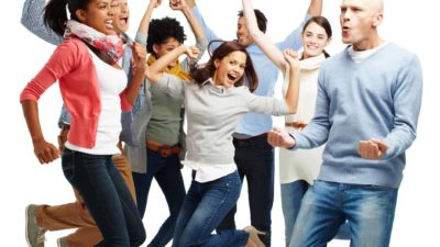 a group of people jump for joy and dance around celebrating good news.