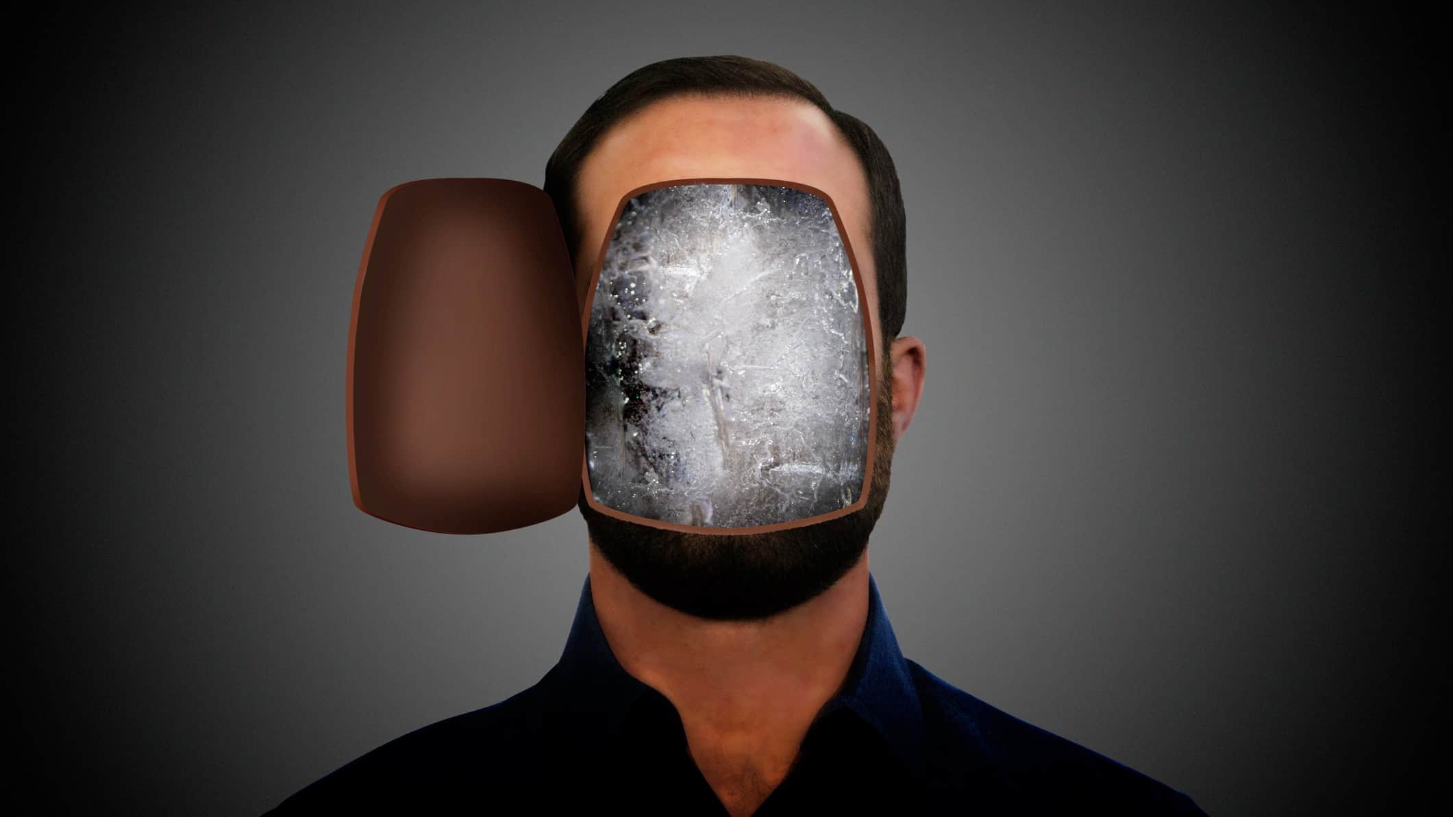 The front of a man's face opens to reveal he has frozen ice for brains.