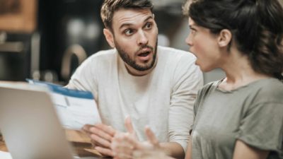 Man and woman looking suprised and shocked