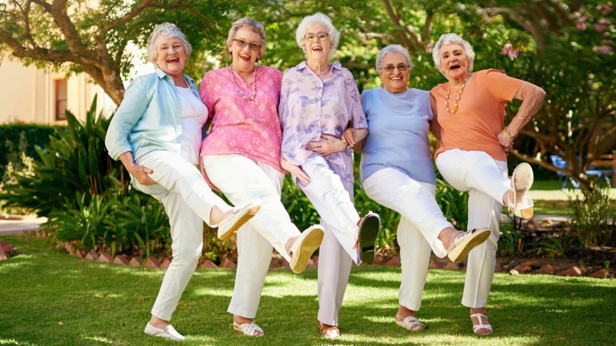 Five female seniors do the can-can line dance to celebrate their ASX share gains and dividends.