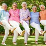 Five female seniors do the can-can line dance to celebrate their ASX share gains and dividends.