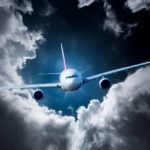 A plane flies into storm clouds.