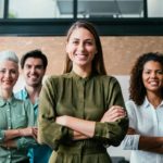 office workers stand togther against workplace harassment