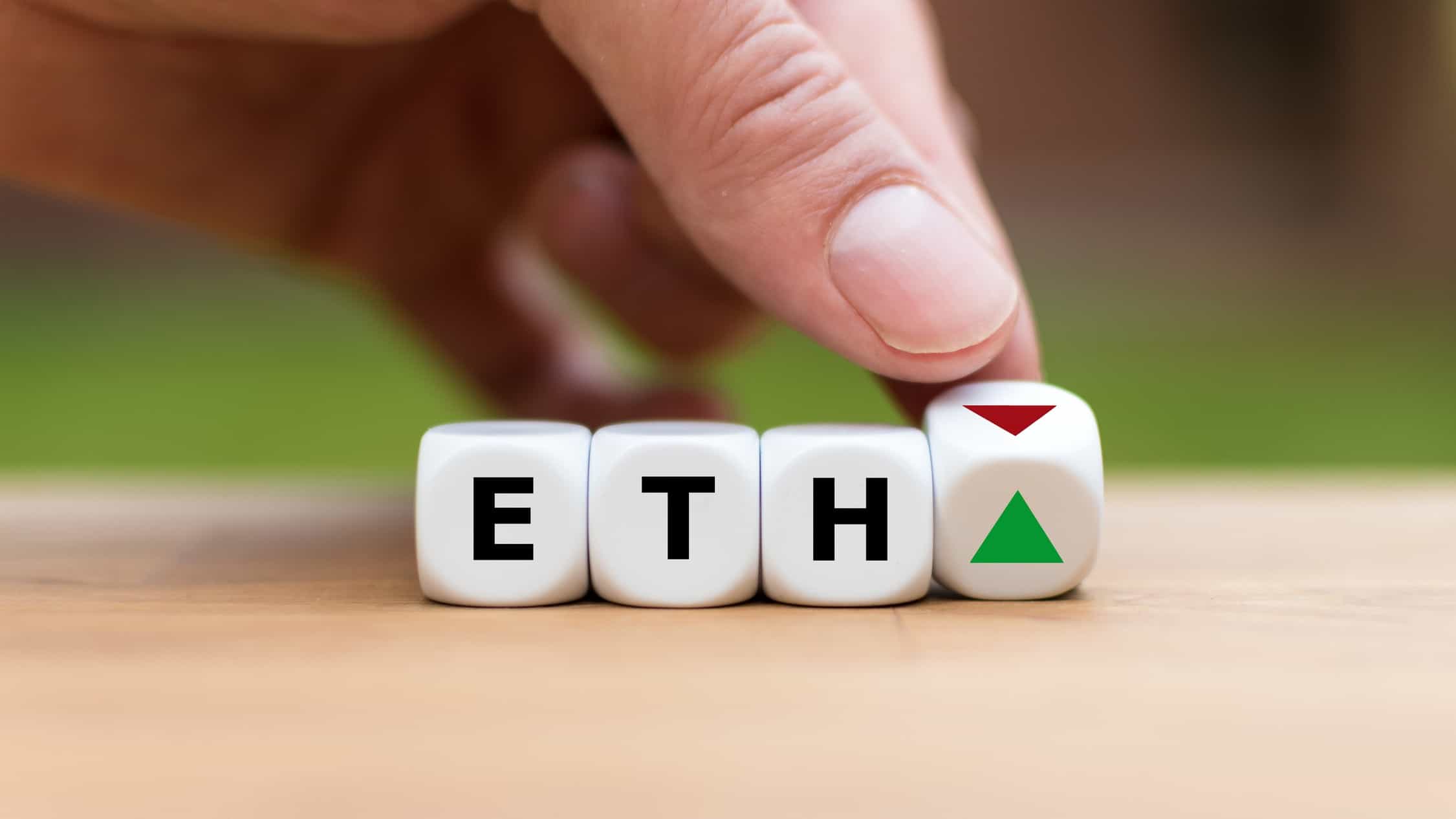 ETH written on white blocks. with red and green arrows.