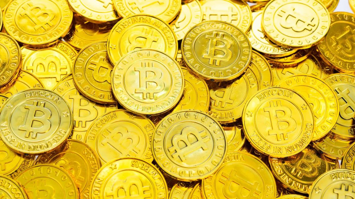 Bitcoin coins in a pile.
