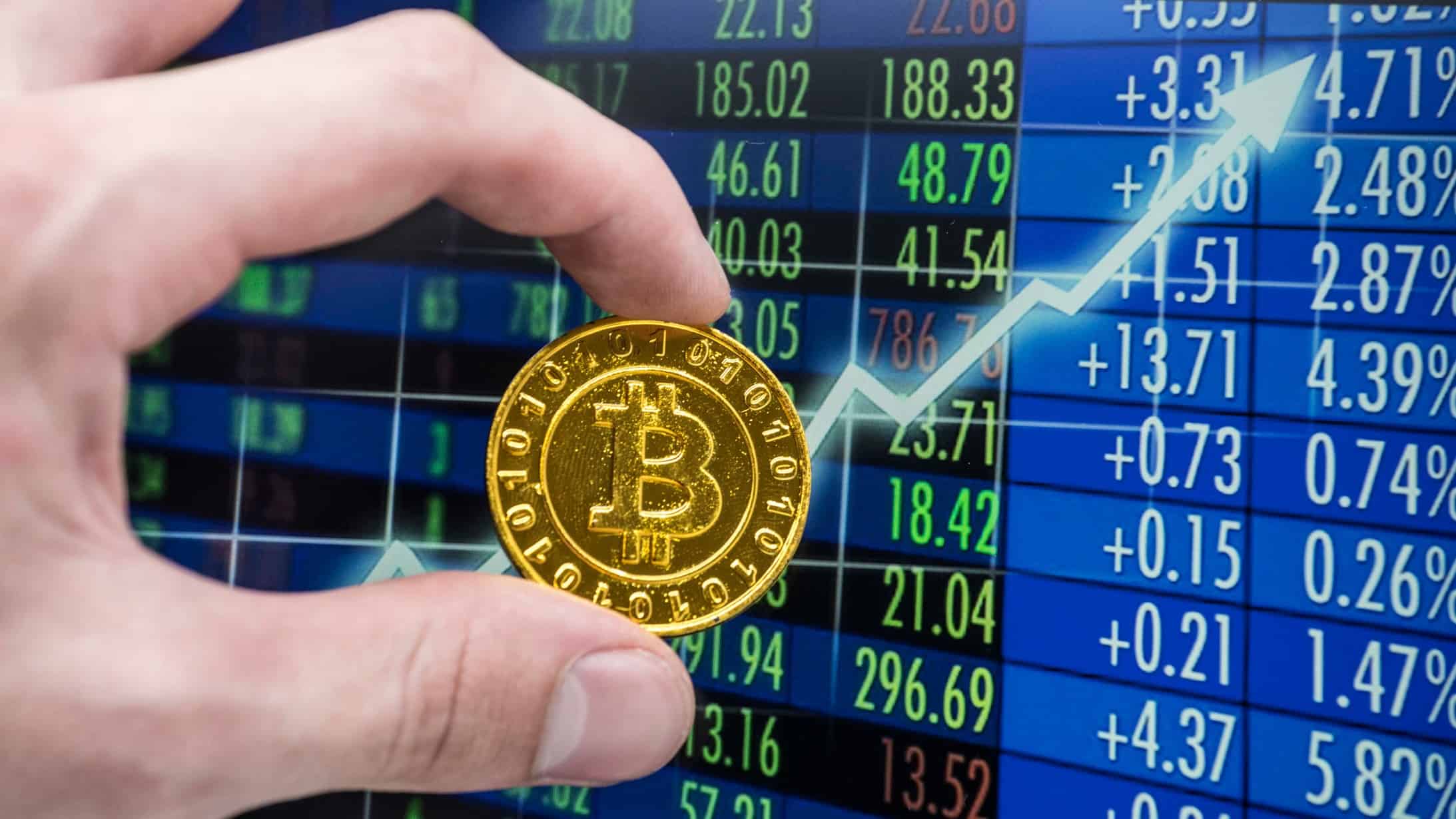 Bitcoin coin with a rising arrow.