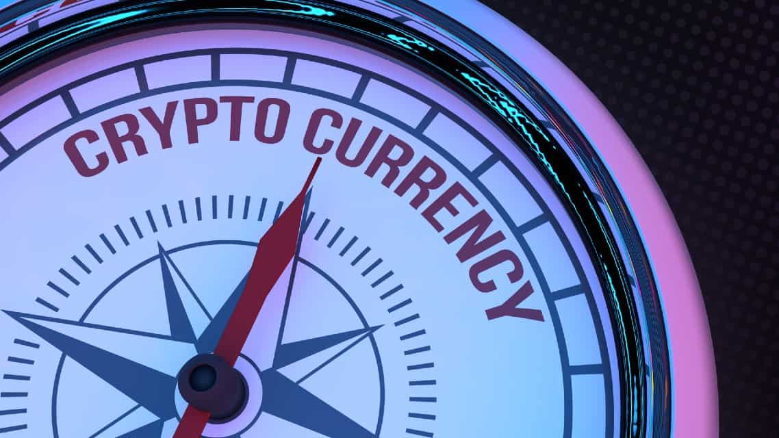 The word cryptocurrency on a round clock.