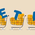 The letters ETF in a trolley with money.