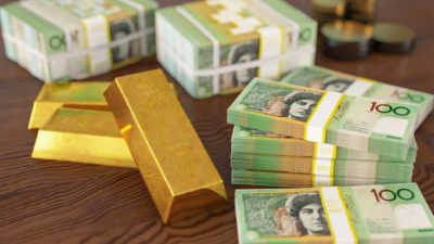 Gold bars and Australian dollar notes.