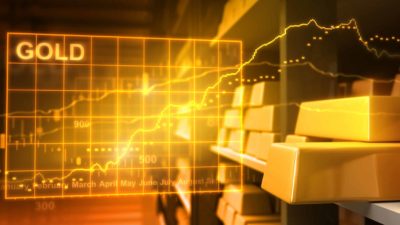 Rising price of gold represented by a share price chart and gold bars.