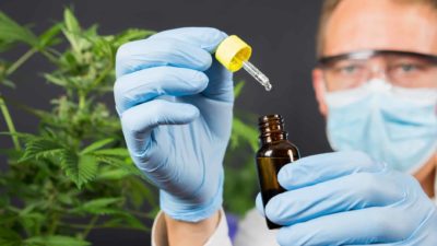 Man holding medical cannabis.