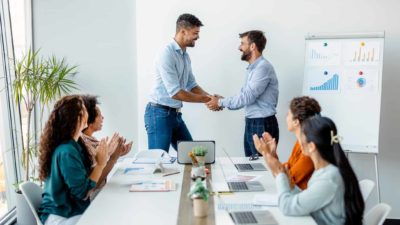 two men shake hands on a deal.