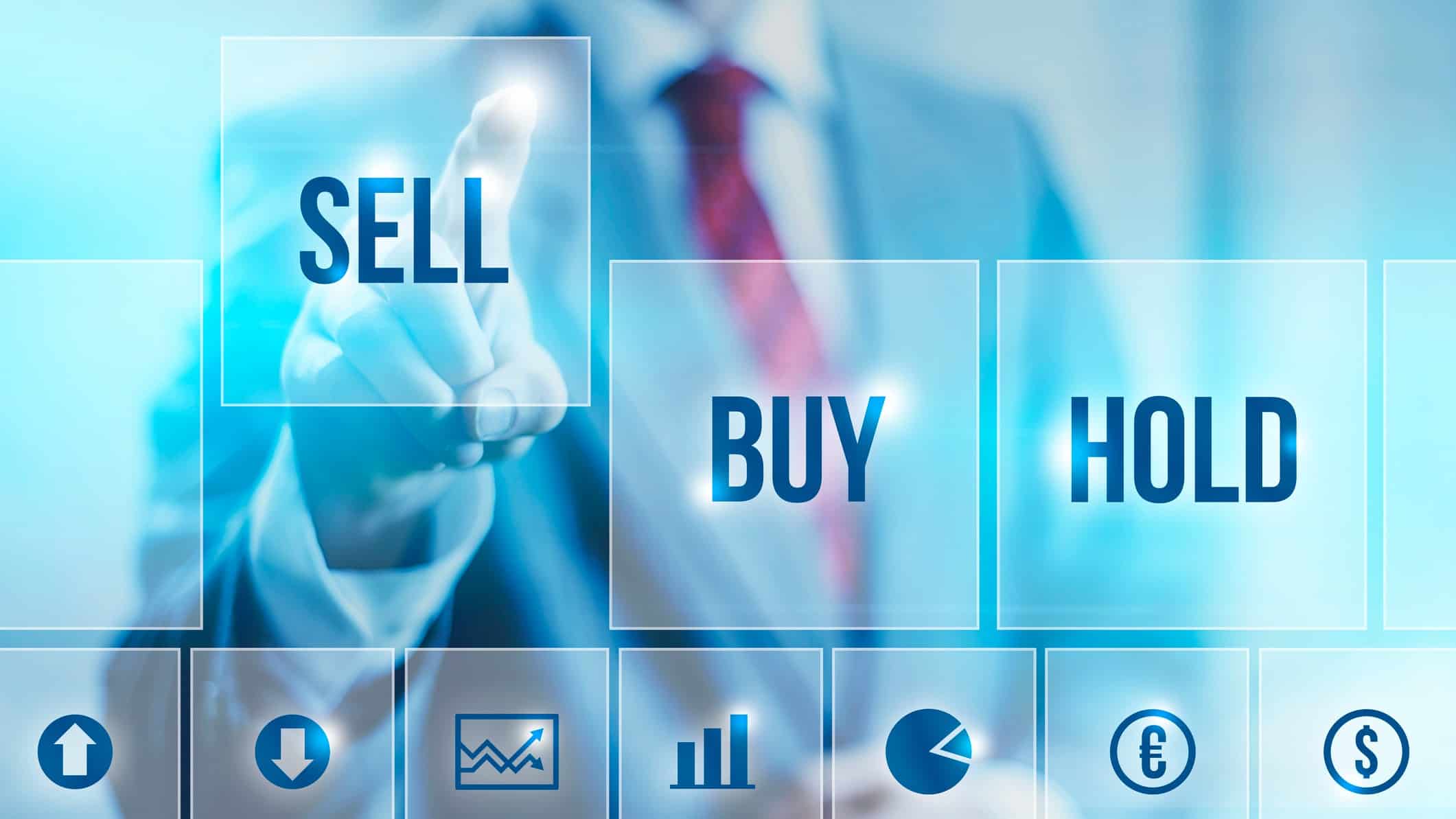 Sell buy and hold on a digital screen with a man pointing at the sell square.