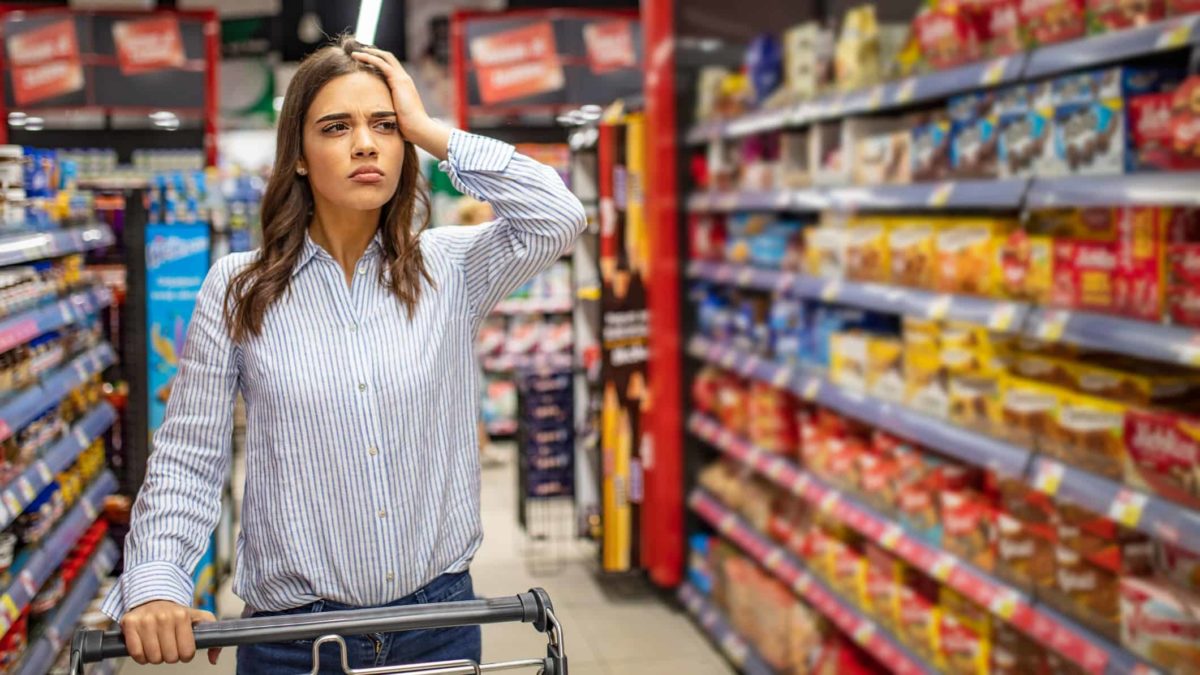 Confused woman at a supermarket.