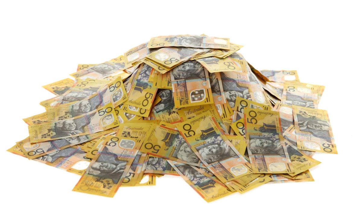 Pile of $50 Australian notes representing dividends.