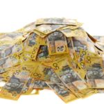 Pile of $50 Australian notes representing dividends.