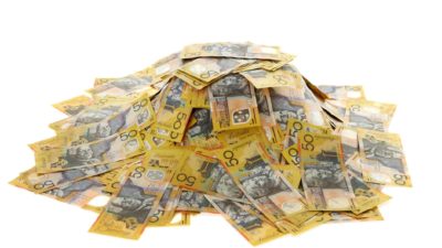 Pile of $50 Australian notes representing dividends.