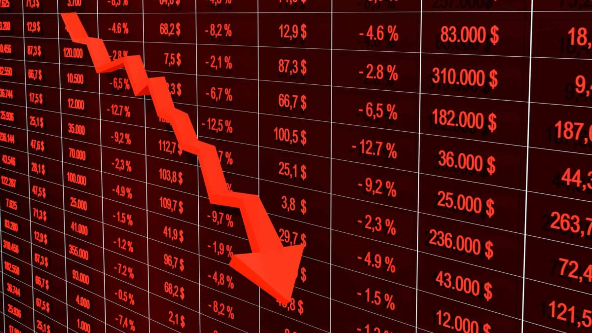 Red arrow going down with share prices in red symbolising a falling share price