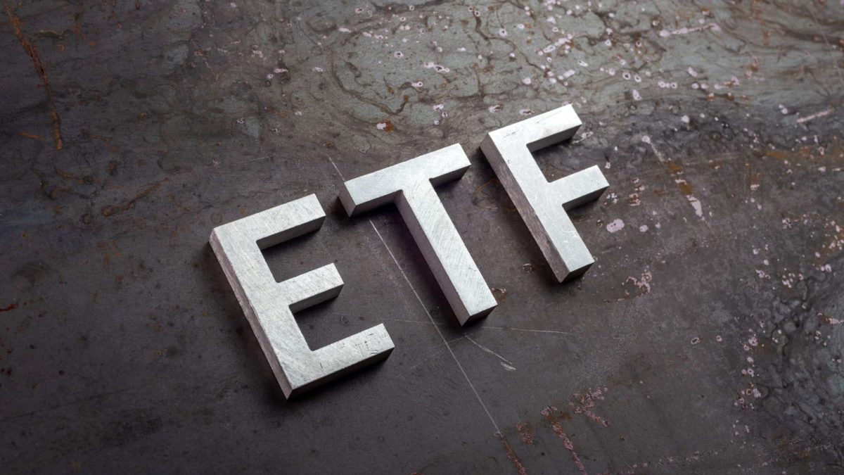 ETF written in white with a blackish background.