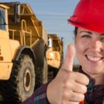 Happy woman miner with her thumb up signalling Wyloo's commitment to back IGO's takeover of Western Areas nickel