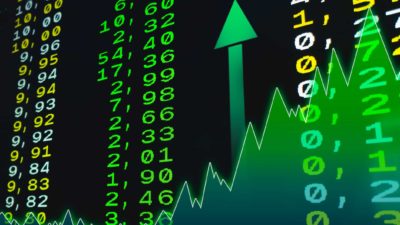 Stock market chart in green with a rising arrow symbolising a rising share price.