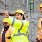Miner putting out her hand symbolising a share price trading halt.