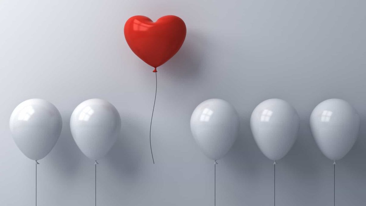 A red heart-shaped balloon float up above the plain white ones, indicating the best shares