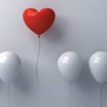 A red heart-shaped balloon float up above the plain white ones, indicating the best shares