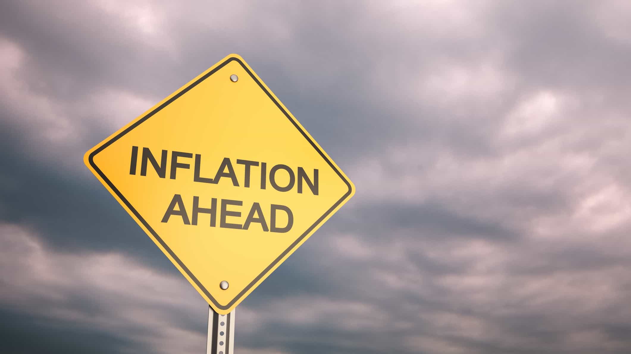 Inflation ahead written on a yellow sign.