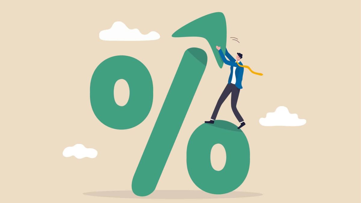 Green percentage sign with an animated man putting an arrow on top symbolising rising interest rates.