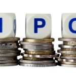 IPO written on block cubes on top of coins.