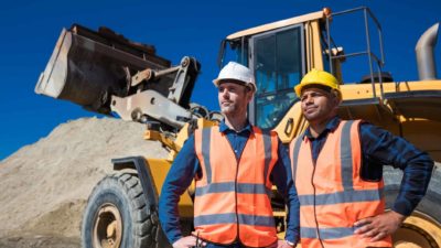 Two miners standing together.