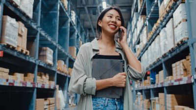 Woman on the phone at a hardware store