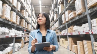 Woman inspecting packages.