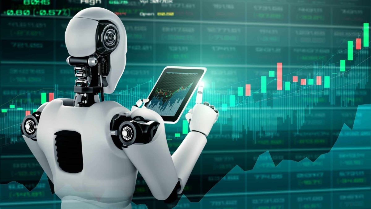 A white and black robot in the form of a human being stands in front of a green graphic holding a laptop and discussing robotics and automation ASX shares