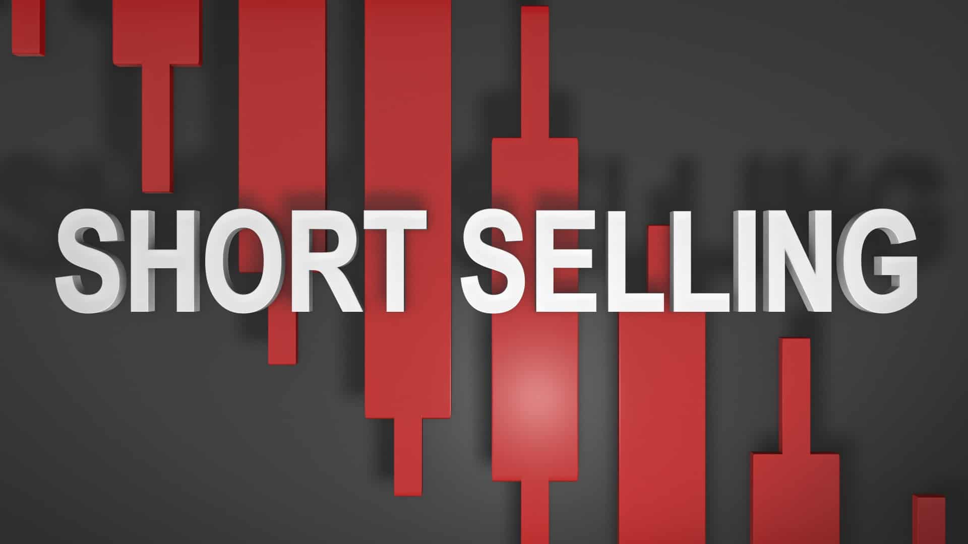 The words short selling in red against a black background