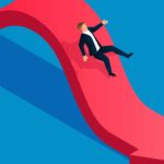 Man going down a red arrow, symbolising a sliding share price.