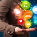 A person holding an animated diagram regarding the tech sector in his hand.