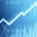 Rising arrow on a blue graph symbolising a rising share price.